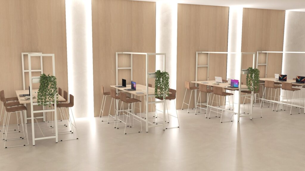 Un espace de bureau moderne et minimaliste comprenant des bureaux en bois, des chaises de style bar, des ordinateurs portables et des plantes vertes sur des étagères blanches - parfaites pour créer des espaces informels contre des murs en bois clair et un éclairage lumineux.