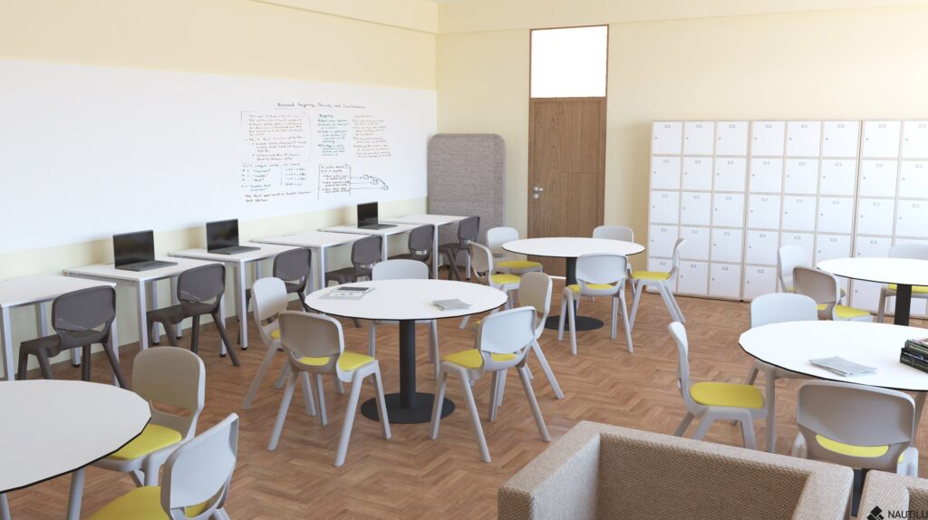 Une salle des enseignants moderne avec des tables et des chaises rondes, une rangée d'ordinateurs portables sur un comptoir, un tableau blanc avec des notes, des casiers le long du mur et un fauteuil beige au premier plan. La salle est lumineuse et organisée.
