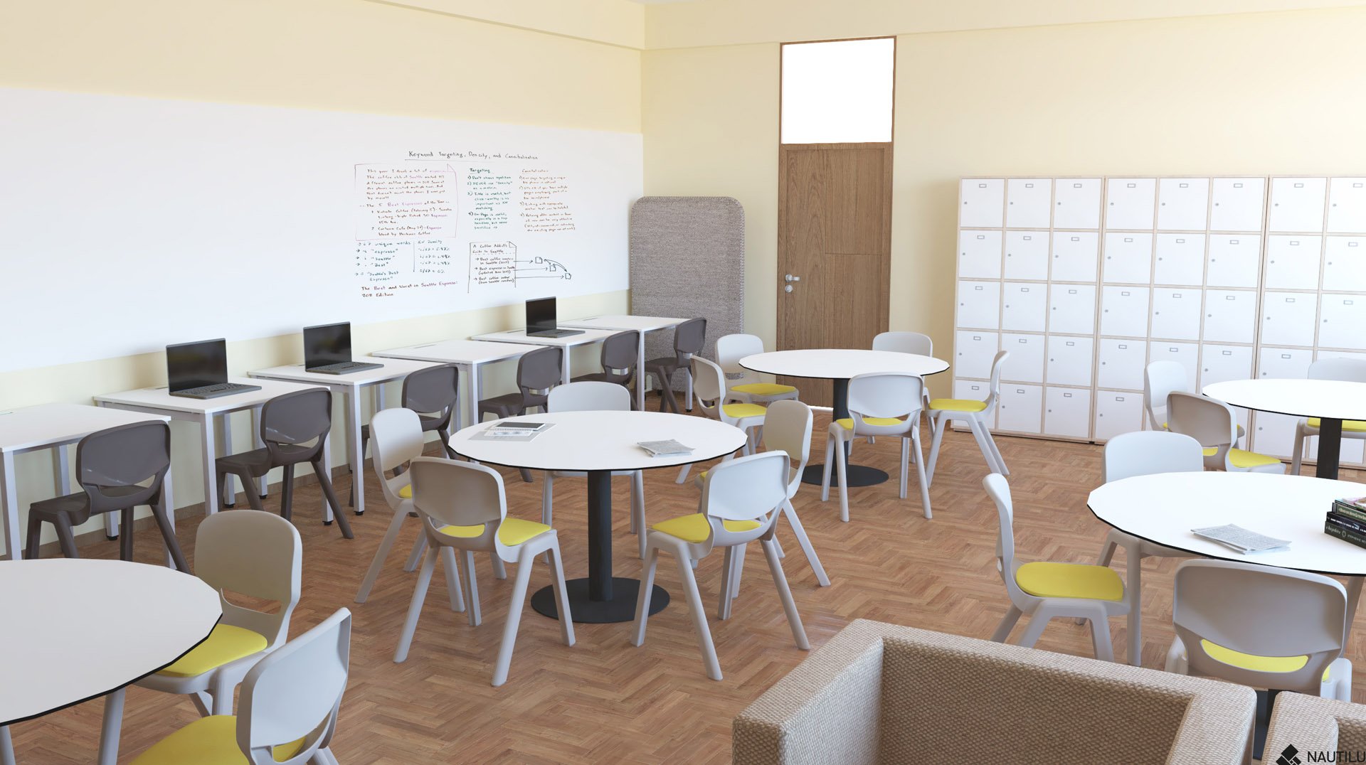 Une salle des enseignants moderne avec des tables et des chaises rondes, une rangée d'ordinateurs portables sur un comptoir, un tableau blanc avec des notes, des casiers le long du mur et un fauteuil beige au premier plan. La salle est lumineuse et organisée.