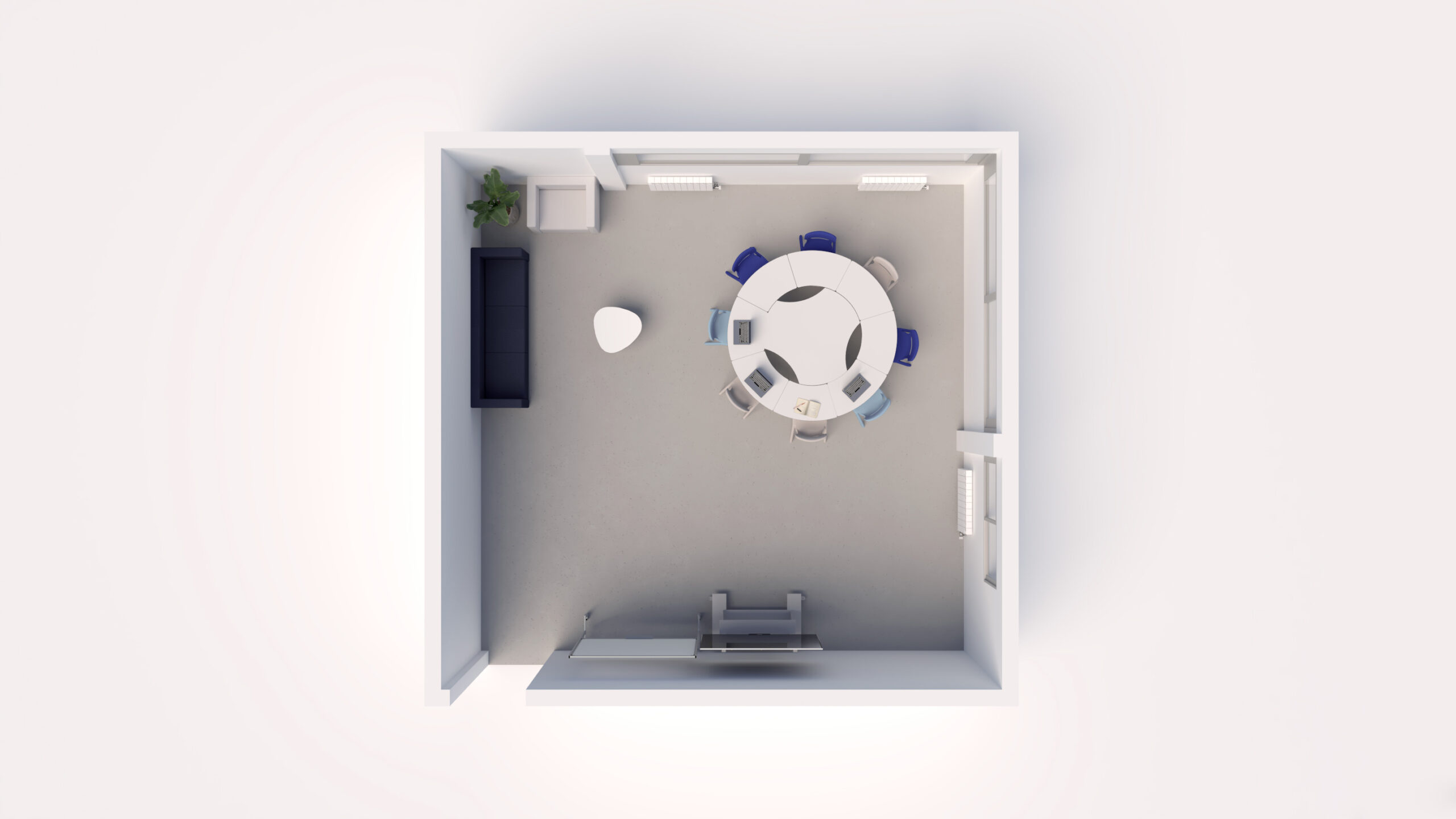 Vue de haut en bas d'une petite pièce moderne conçue pour les espaces informels, comprenant une table ronde avec six chaises, un canapé noir, une plante en pot, une table d'appoint blanche et un téléviseur ou un écran fixé au mur en face du canapé.