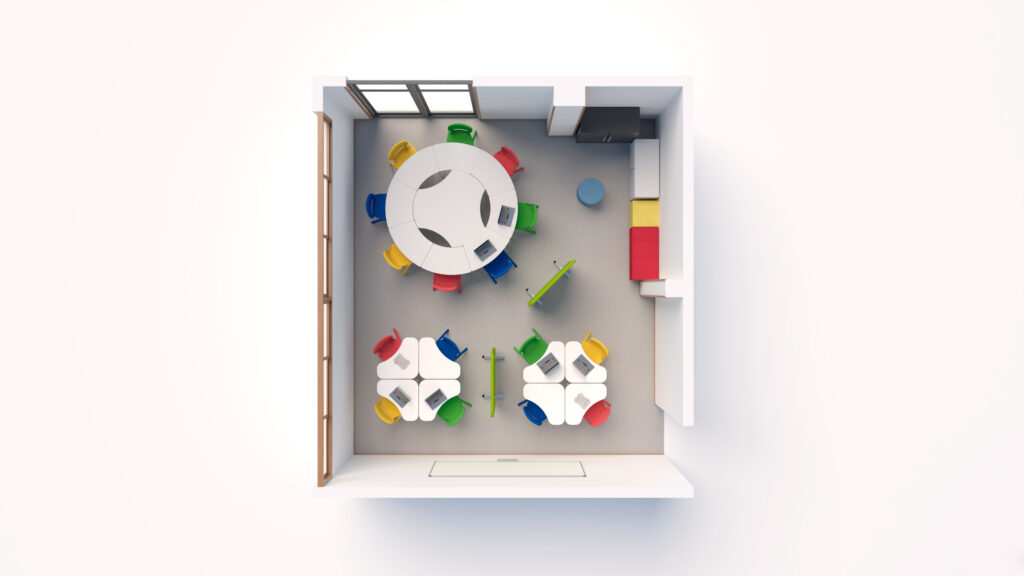 Vue de haut en bas d'une salle de classe Ateca colorée avec des tables rondes et hexagonales, des chaises multicolores, un banc vert, un tabouret bleu, des meubles de rangement et de grandes fenêtres dans une salle carrée lumineuse de l'Aula Mentor du CEPA.