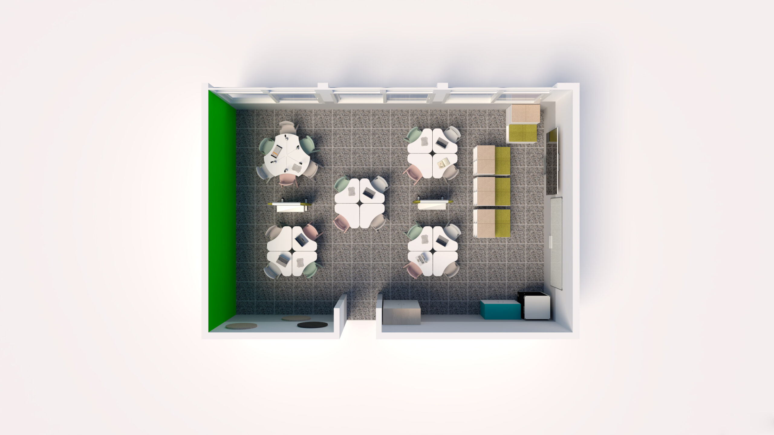 Vue de haut en bas d'une petite salle de classe CEPA avec quatre tables groupées et des chaises colorées, un mur d'accent vert, des casiers de rangement et un coin lecture accueillant - idéal pour un environnement d'apprentissage Aula Mentor ou Ateca.