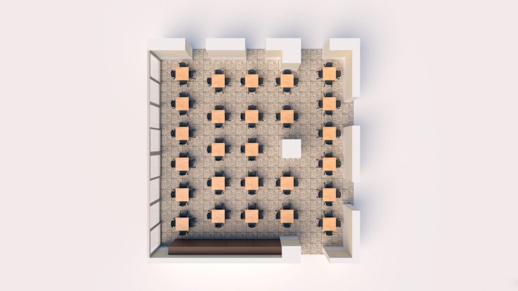 Vue de haut en bas d'une salle de classe composée de six rangées de quatre bureaux chacune, disposées en grille. Le bureau de l'enseignant se trouve à l'avant et de grandes fenêtres sont disposées le long d'un mur. Un sol à motifs est visible dans toute la salle.